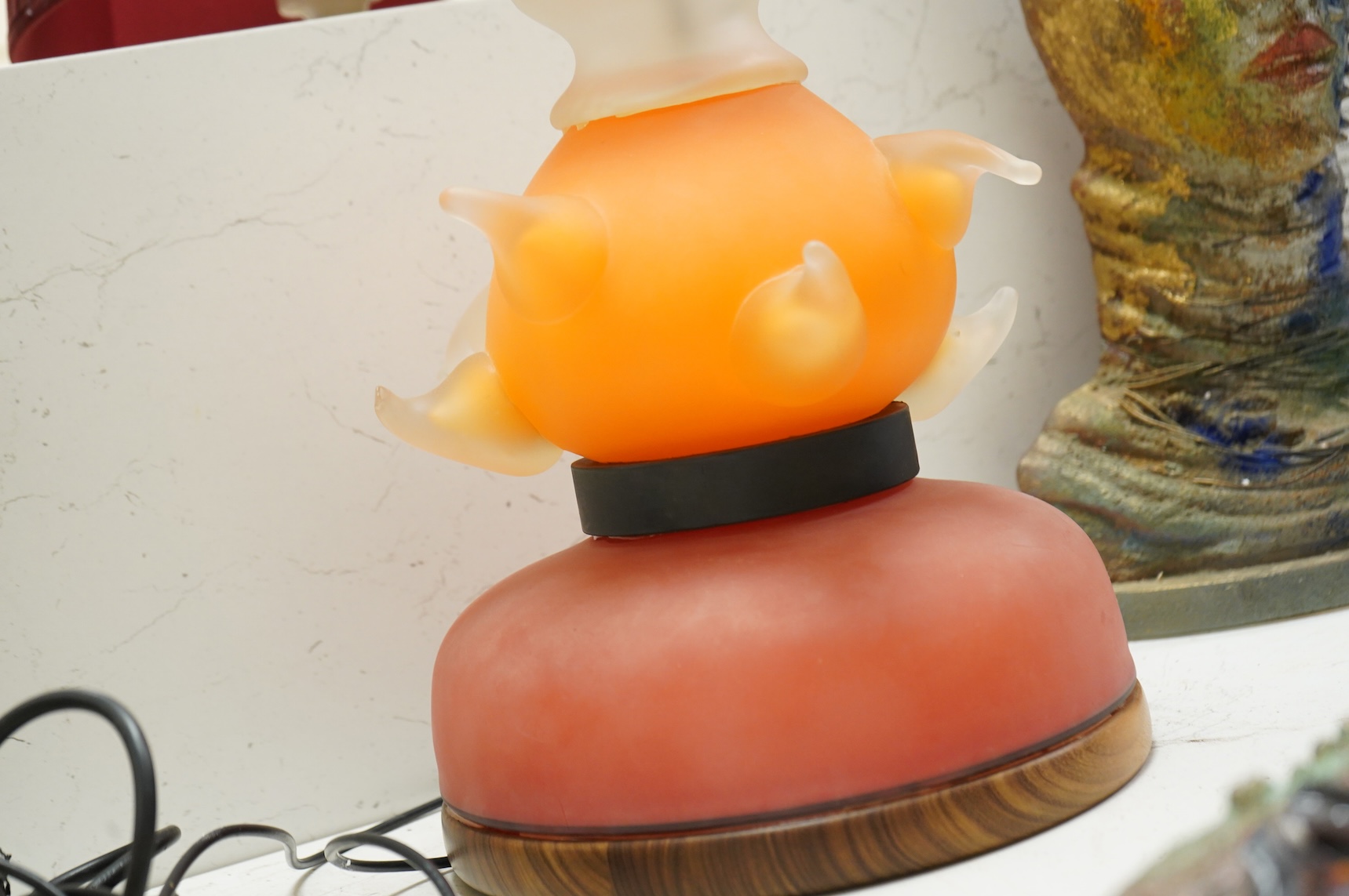 A sculptural coloured glass table lamp, signed DSR - 73cm high